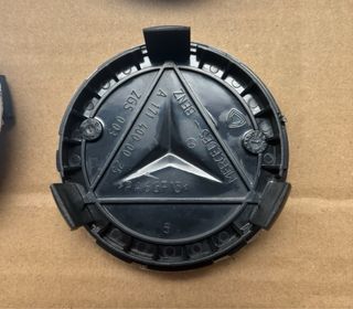 4 Tapabujes Mercedes Benz 75mm negro plata nuevos