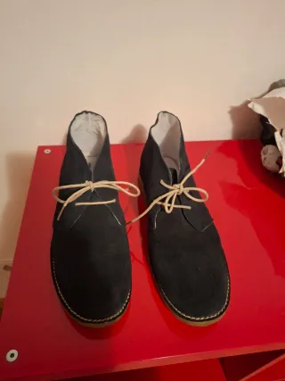 Zapato tipo botín de piel vuelta para hombre
