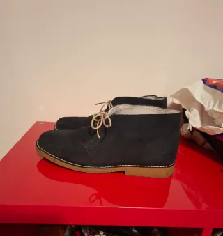 Zapato tipo botín de piel vuelta para hombre
