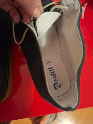 Zapato tipo botín de piel vuelta para hombre