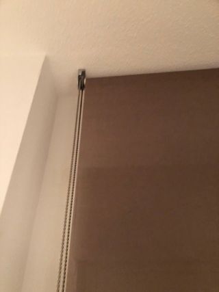 Estor enrollable marrón tela