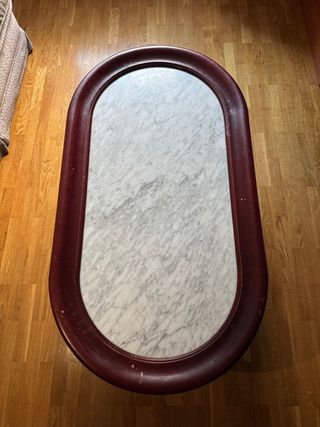 Mesa de centro ovalada de madera y mármol