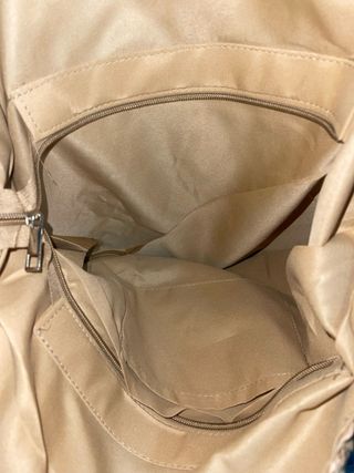 Bolso redondo de rafia con asas de piel