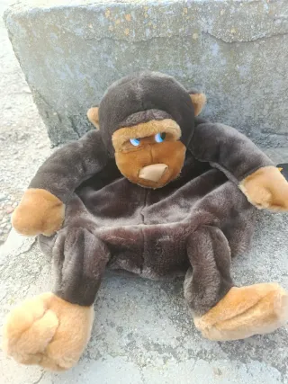 Mochila de peluche mono