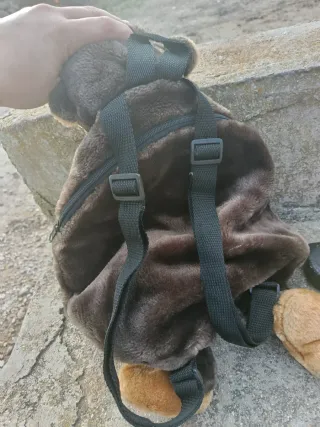 Mochila de peluche mono