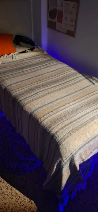 Manta decorativa con flecos