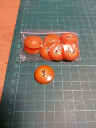 Lote botones salmón y naranja