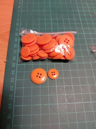 Lote botones salmón y naranja