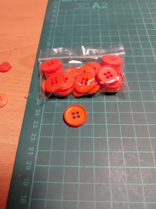 Lote botones salmón y naranja