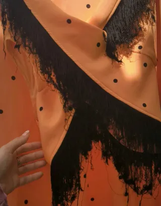 Traje de gitana naranja.