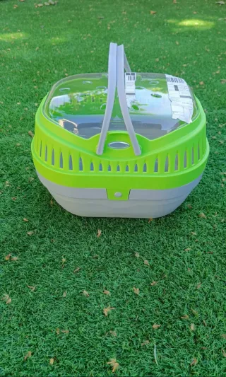 Transportín para mascotas verde y transparente