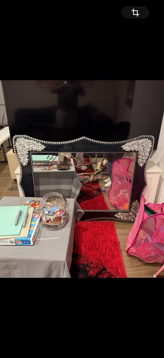 Espejo decorativo negro y plateado