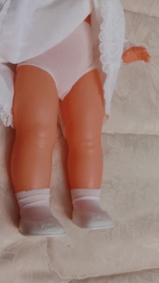 muñeca antigua en perfecto estado,mide 44 ctm