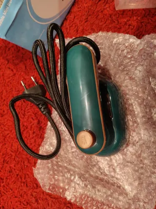 Mini plancha plegable con spray