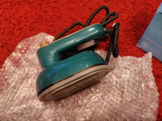 Mini plancha plegable con spray