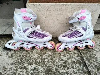 Roller bianchi e rosa con confezione originale