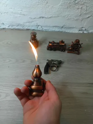 Lote de encendedores de cobre figuras distintas