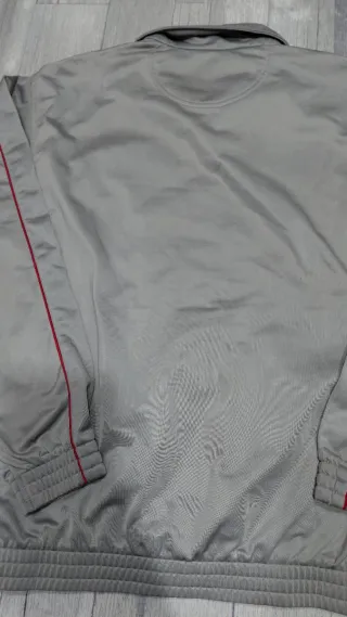 Felpa Lotto grigia con zip rossa