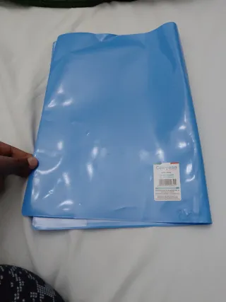 Una copertura per il quaderno, azzurro