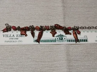 Bracciale con pesci rossi e argento