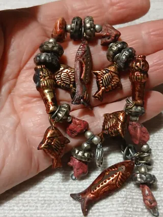 Bracciale con pesci rossi e argento