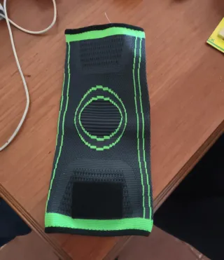 Joelheira de compressão com suporte