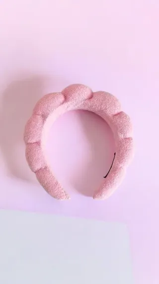 Diadema de peluche rosa