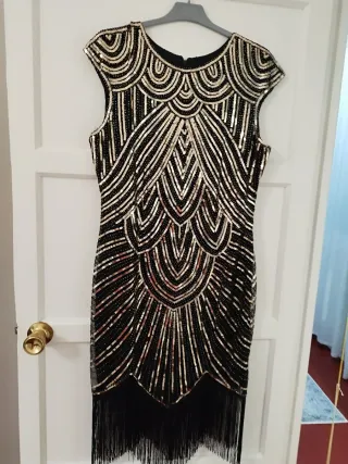 Vestido de fiesta negro y dorado