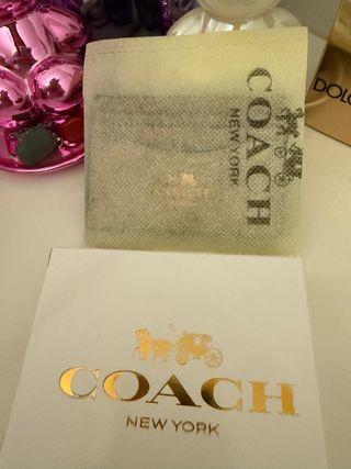 Porta cartões Coach bege e castanho