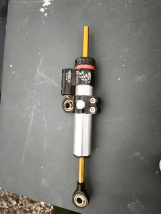 Amortiguador de dirección moto