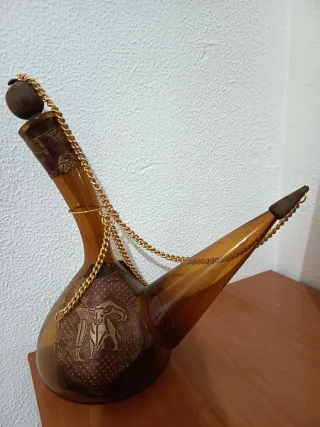 Porrón vidrio ámbar vintage con cuero 45€ negociab