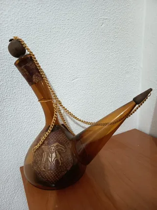 Porrón vidrio ámbar vintage con cuero 45€ negociab