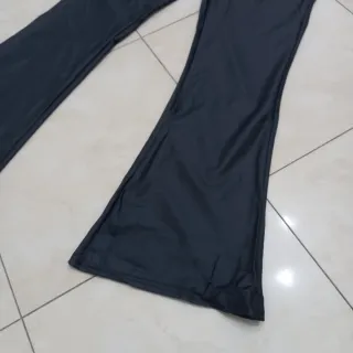 Pantaloni a zampa similpelle neri tg