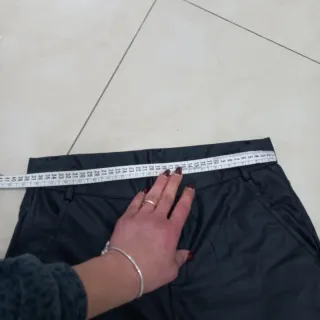 Pantaloni a zampa similpelle neri tg