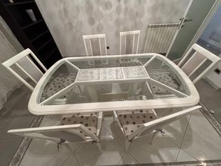 Tavolo con piano in cristallo