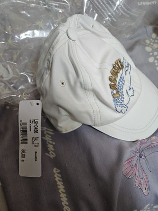 Gorra Lacoste Blanca y otra negra precio por unida
