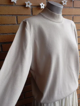 Jersey lana cuello alto beige