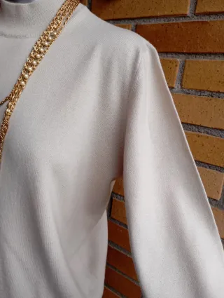 Jersey lana cuello alto beige