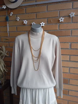 Jersey lana cuello alto beige