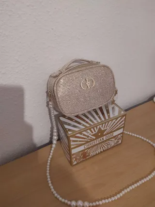 Neceser Dior dorado brillante