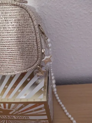 Neceser Dior dorado brillante