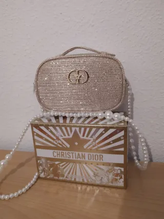 Neceser Dior dorado brillante