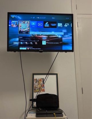 PS4 (PlayStation 4) Negra + 1 mando +juegos