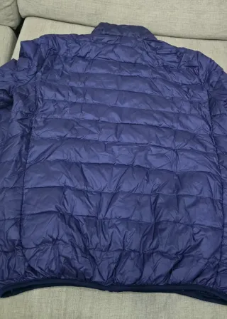 Abrigo plumífero ligero azul