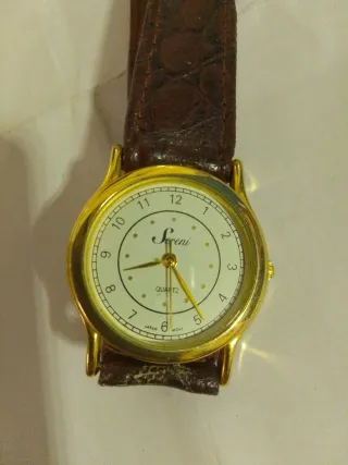 Orologio vintage Sereni oro e marrone