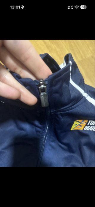 Giacca sportiva Asics blu e bianca