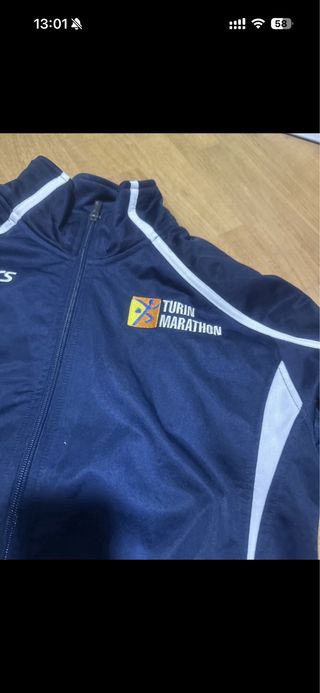 Giacca sportiva Asics blu e bianca
