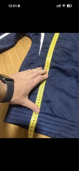 Giacca sportiva Asics blu e bianca