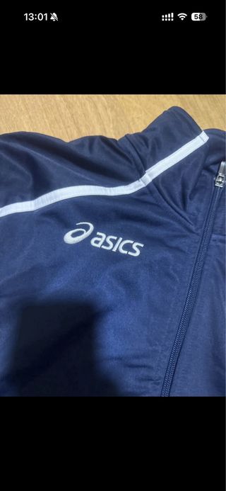Giacca sportiva Asics blu e bianca