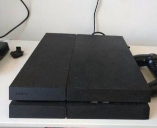 PS4 (PlayStation 4) con 5 juegos